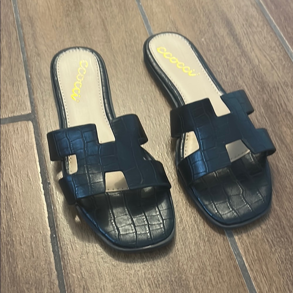 Black H sandals. Croc- embossed. Sz 8. Never worn. Excellent condition in box.